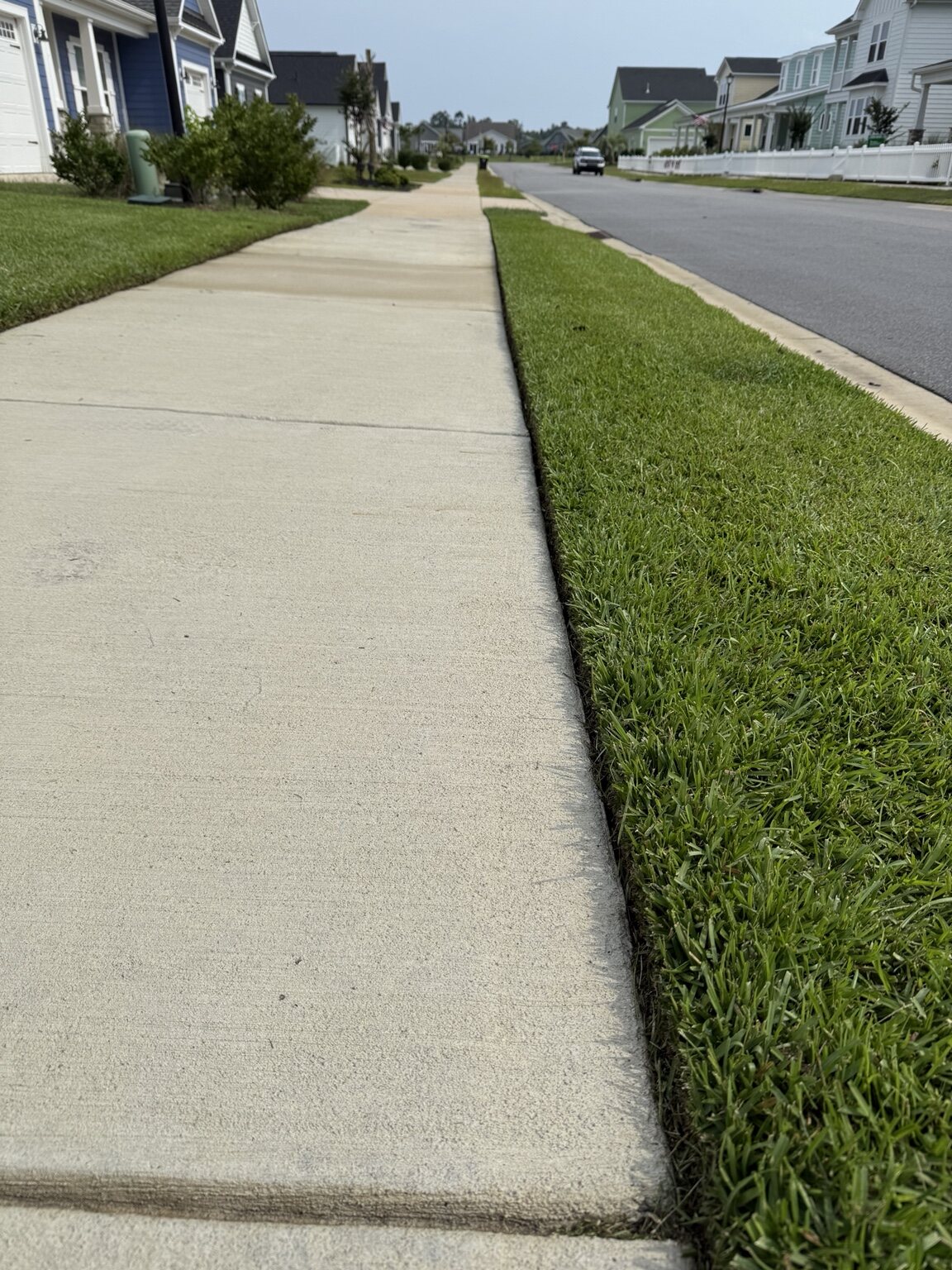 Crisp sidewalk edging by GroundWorx