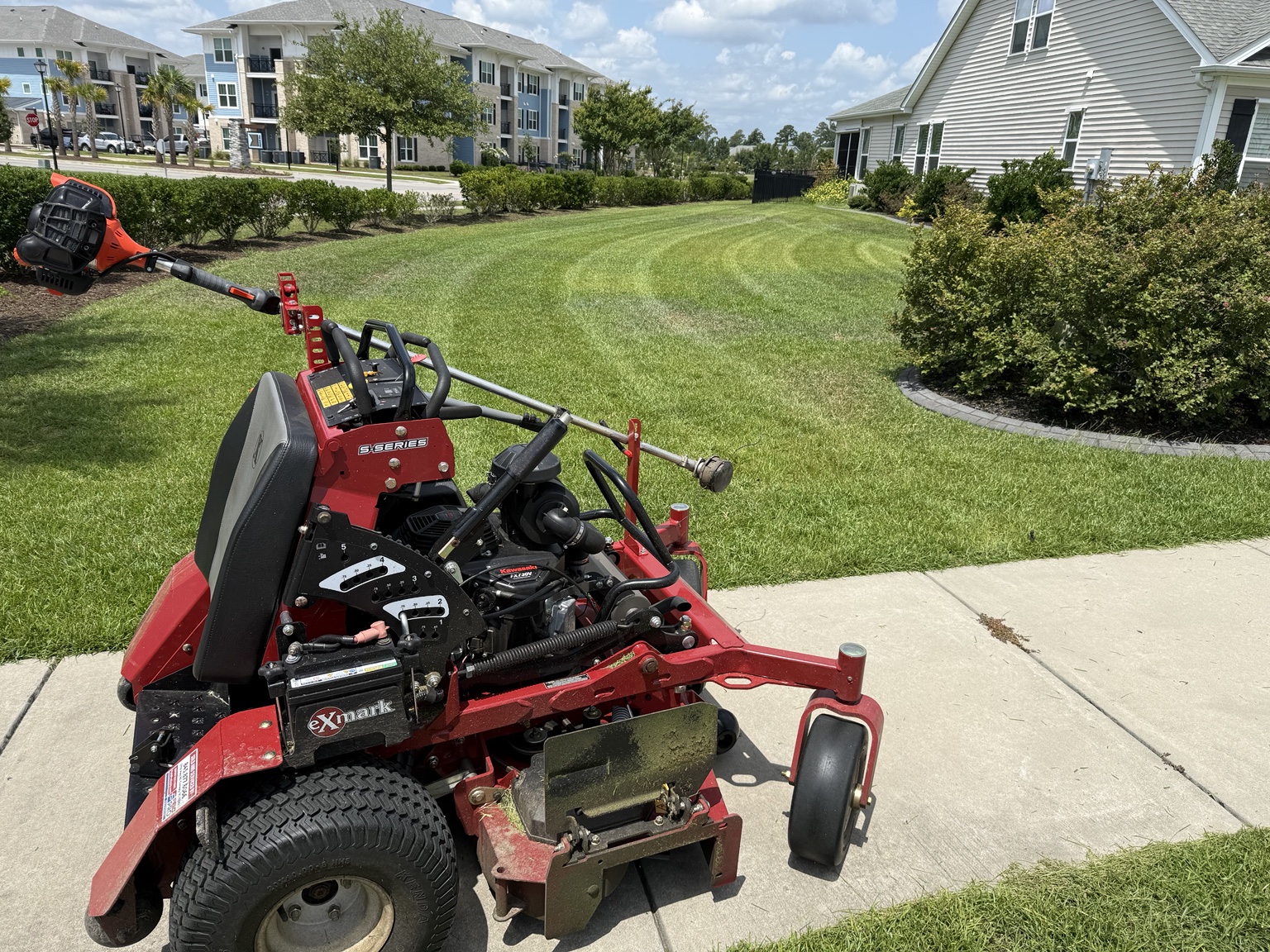Freshly striped lawn maintained by GroundWorx