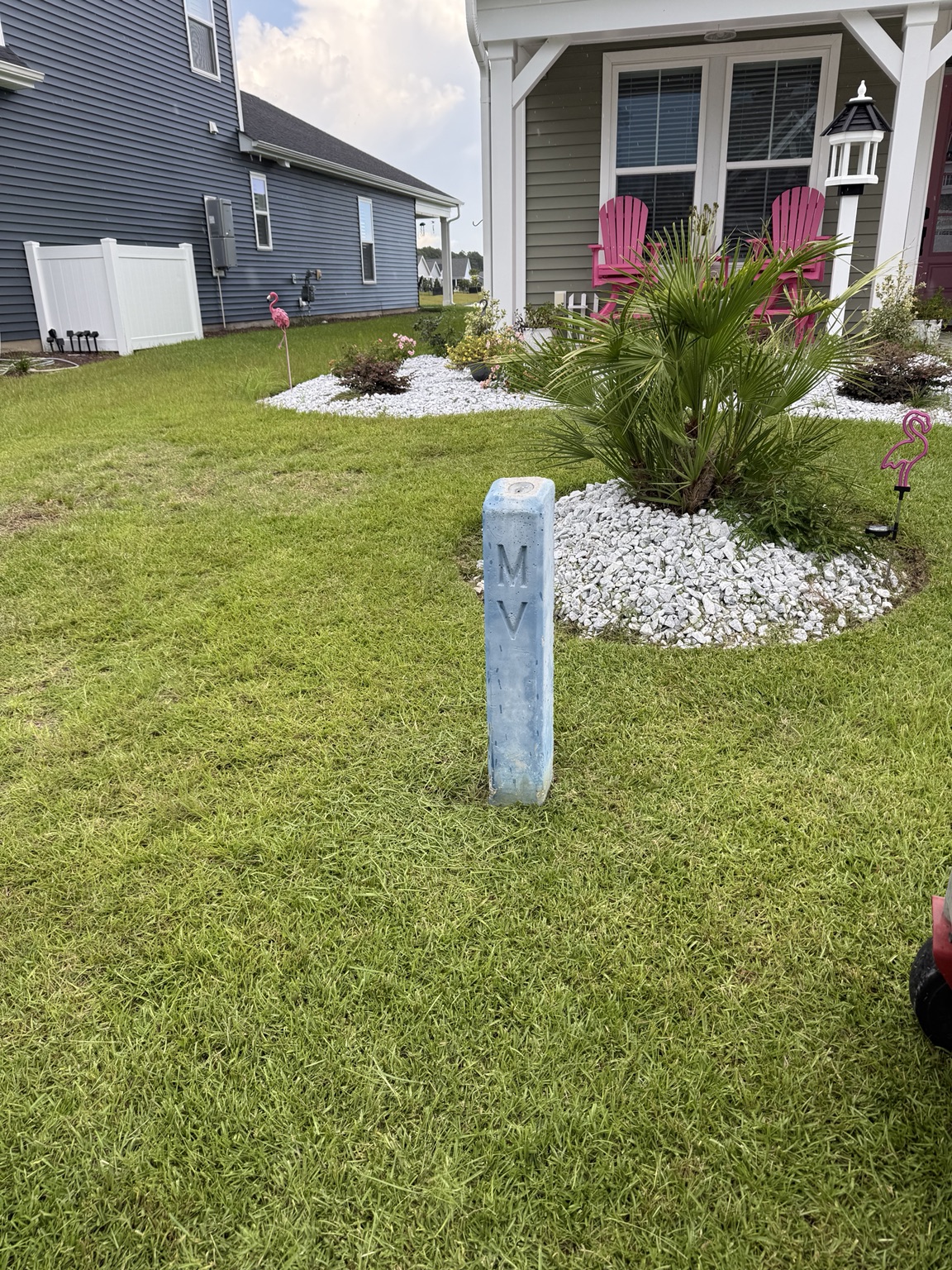 River rock and coastal plant installation